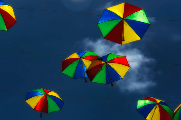The little and colorful umbrellas are used in brazilian carnival for dancing Frevo, a traditional musical rhythm of the northeast region, specially in the state of Pernambuco