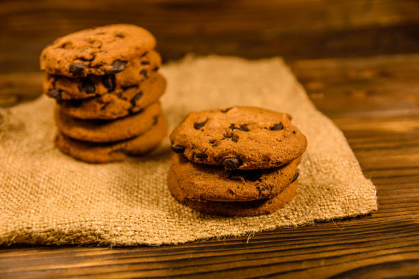 istock Chocolate chip cookies on sackcloth on a wooden table 915839824
