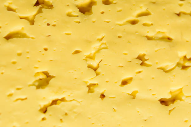 istock Texture of the sliced cheese for background 915839938