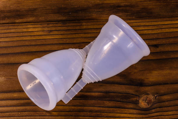 istock Two menstrual cups on a wooden table 915839962