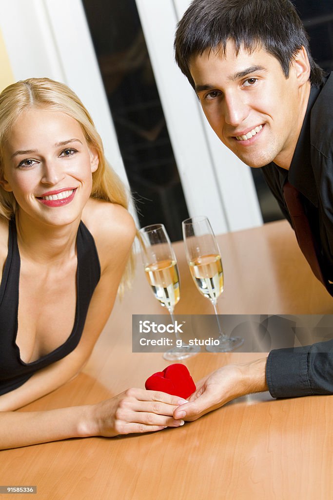Happy young attractive couple and special proposal  Adult Stock Photo