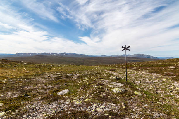 istock Hiking path with mountains with snow in the background 915861854