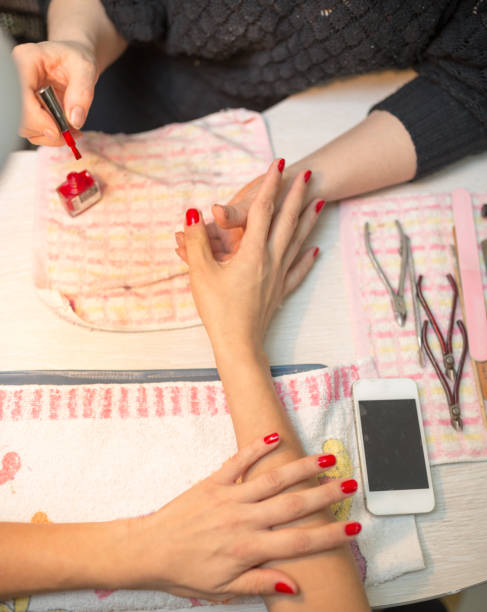 istock Manicure in a beauty salon 915886378