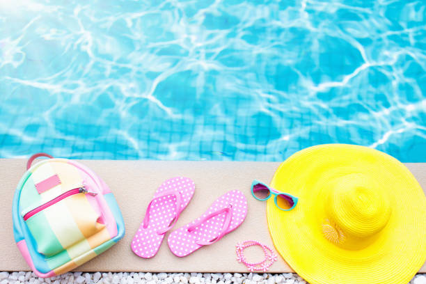 istock Pool and beach items flat lay. Summer vacation. 915886432