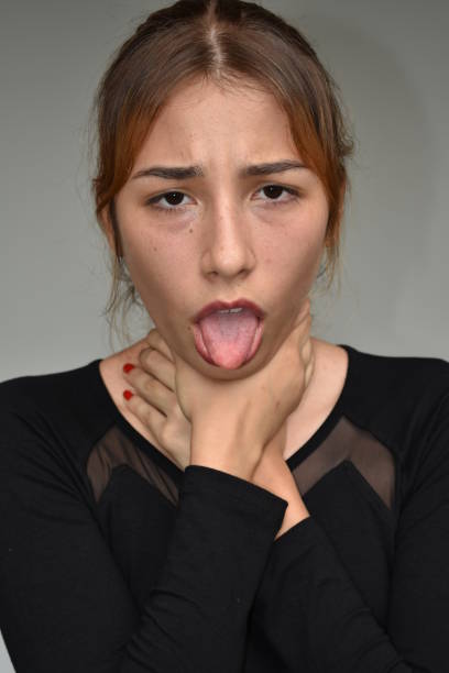 istock Beautiful Girl Choking 915889118