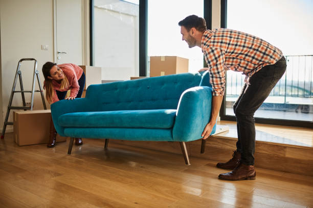 istock Couple in new apartment 915889880
