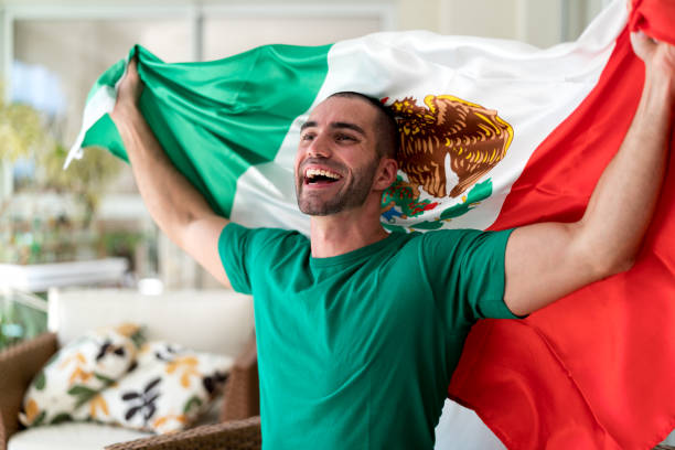 patriotism and celebration of a mexican young fan - house home interior flag usa imagens e fotografias de stock