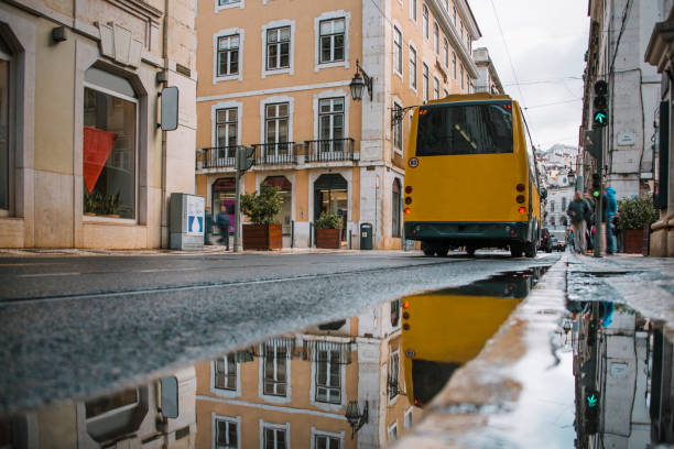 Yellow Tram light trail in a Lisbon street - Lisbon, Portugal