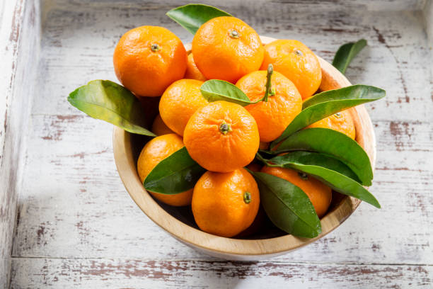 istock Delicious and beautiful mini Tangerines with leaves 915896842