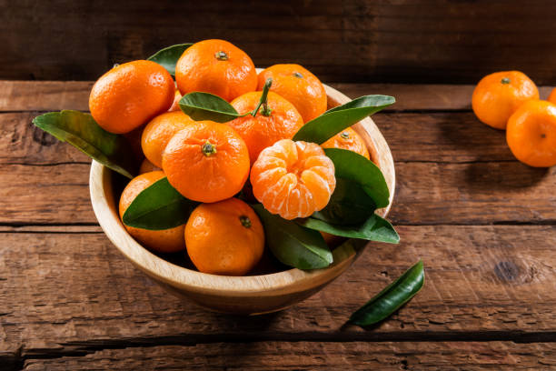istock Delicious and beautiful mini Tangerines with leaves 915897114