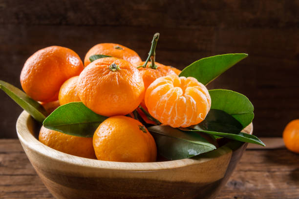 istock Delicious and beautiful mini Tangerines with leaves 915897168