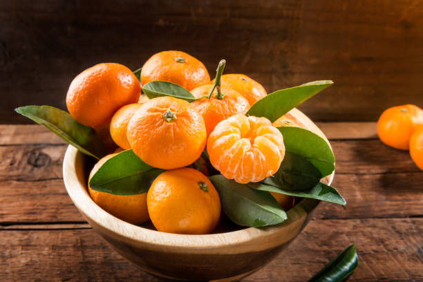 istock Delicious and beautiful mini Tangerines with leaves 915897426