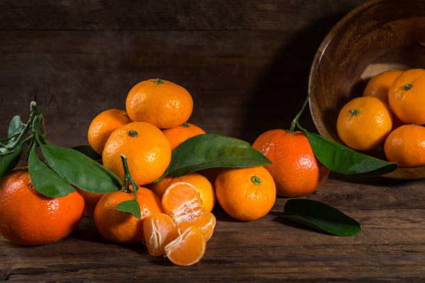istock Delicious and beautiful mini Tangerines with leaves 915897526