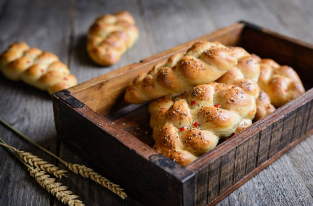 istock Braided bread rolls with red bell pepper, chili and chia seeds 915897608