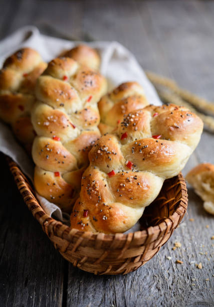 istock Braided bread rolls with red bell pepper, chili and chia seeds 915897640