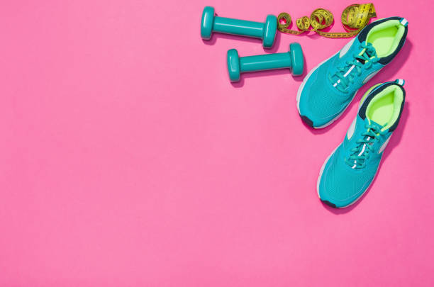 istock Fitness accessories on seamless background mock up, top view 915899800