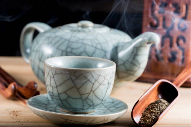 istock Traditional cup of steaming tea with accessories 915900120