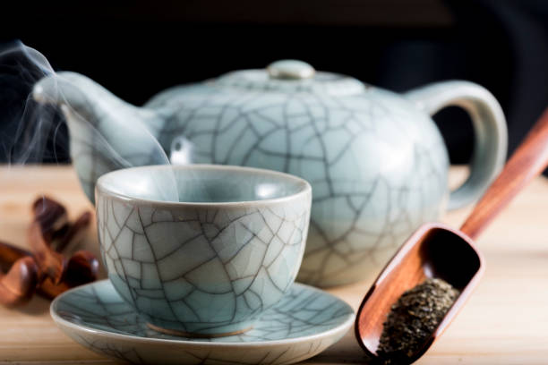 istock Traditional cup of steaming tea with accessories 915900124