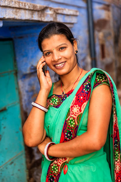 istock Young Indian woman using mobile phone, Jodhpur, India 915900642