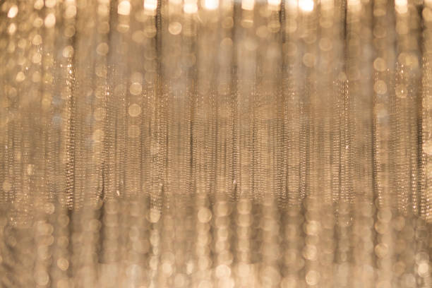 istock hanging chandelier with strings of glass 915943040
