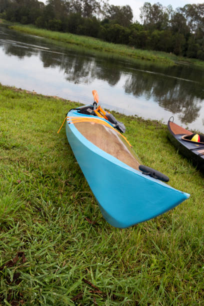 istock Two handmade kayaks at Creek 915952466