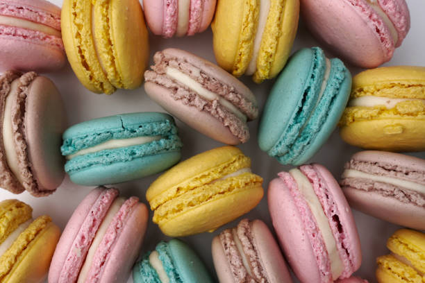 istock Pink, beige and blue macaroons, flat lay style. 915962244
