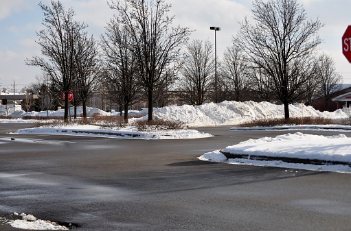 Parking lot cleared of snow after blizzard. NW Chicago suburb. February 7, 2018.