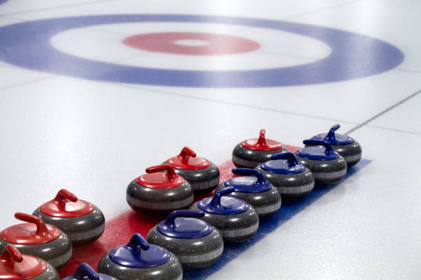 istock Red and Blue Curling Rocks with End Circle 915969408