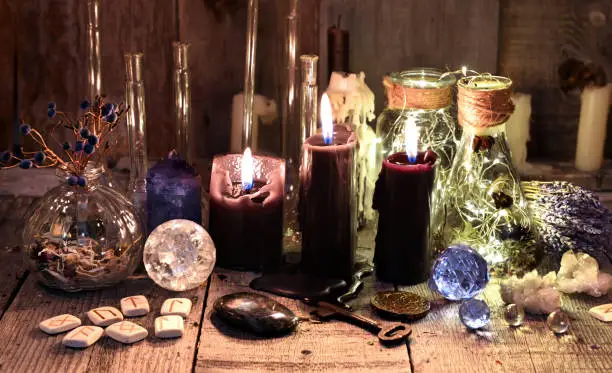 Occult, esoteric, divination and wicca concept. Halloween background with vintage objects