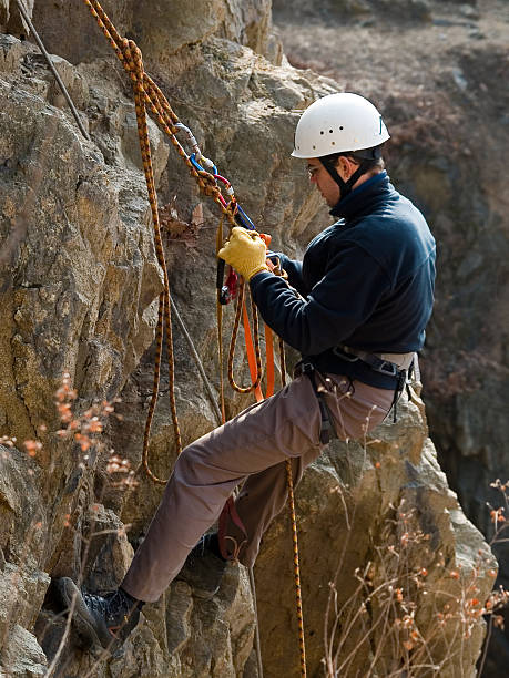 istock mountaineer on the rock 91597342