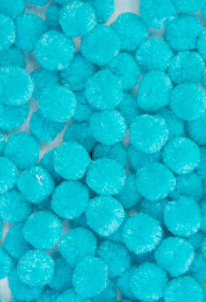 istock Blue pom pom background, blue  background 915978884
