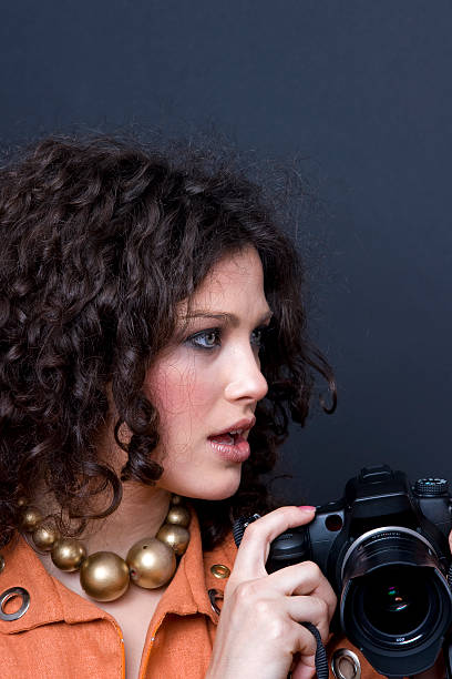 istock Beautiful girl with a camera 91598103