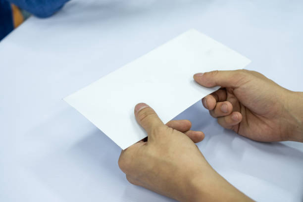 Hand businessman giving blank white envelope document