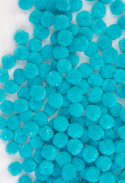 istock Blue pom pom background, blue  background 915984024