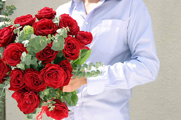 istock Man giving Red Roses.Valentines Day 91599206