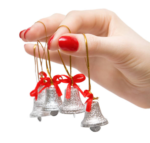 istock Woman hand with small bells on fingers 91599241