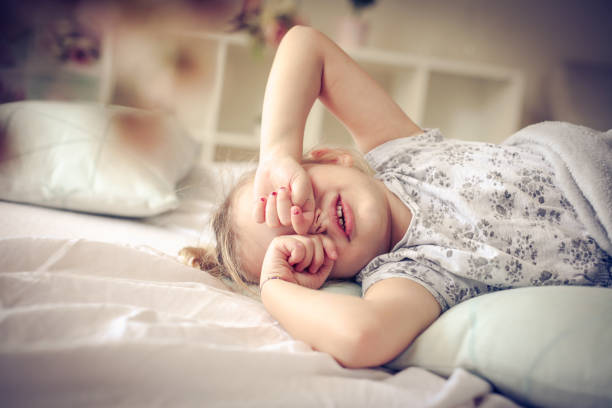 tired little girl. - sleeping child bedtime little girls imagens e fotografias de stock