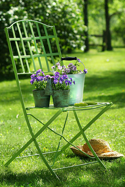 Green garden chair stock photo