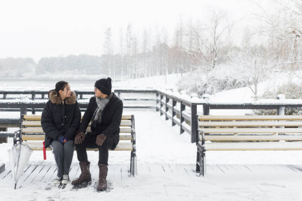 istock young couple sitting in a pavilion 916000684