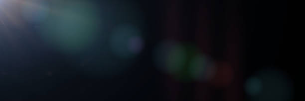 istock mainly off screen lens flare effect overlay banner texture with bokeh and lens distortion effects in front of black background 916011114