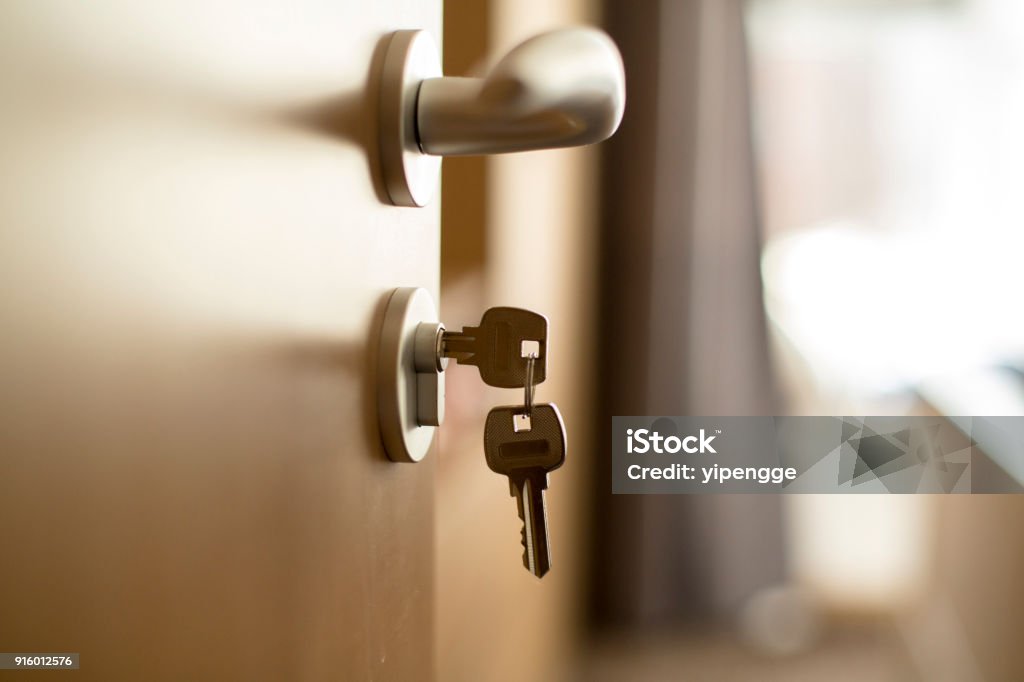 key in door lock Door Stock Photo