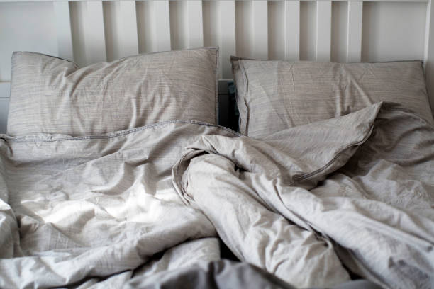 istock bed in the morning 916012606