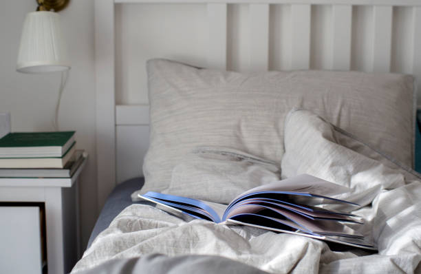 istock book on bed in the morning 916012622