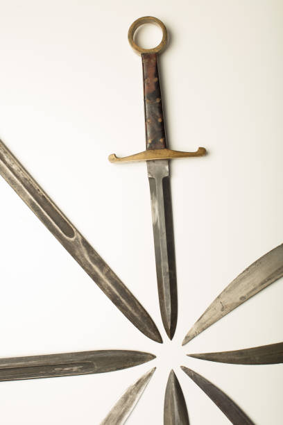 Isolated dagger with assorted blades of weapons stock photo