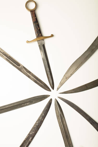 Isolated dagger with assorted blades of weapons stock photo