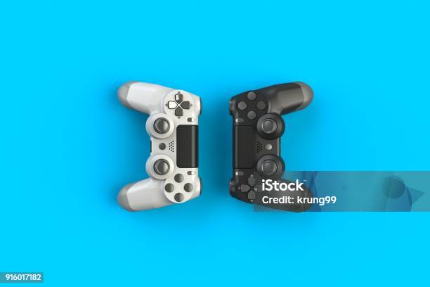 Computer Game Competition Gaming Concept White And Black Joystick Isolated On Blue Background 3d Rendering Stock Photo - Download Image Now