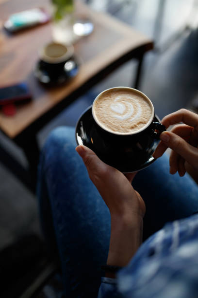 istock Woman in cafe 916017872
