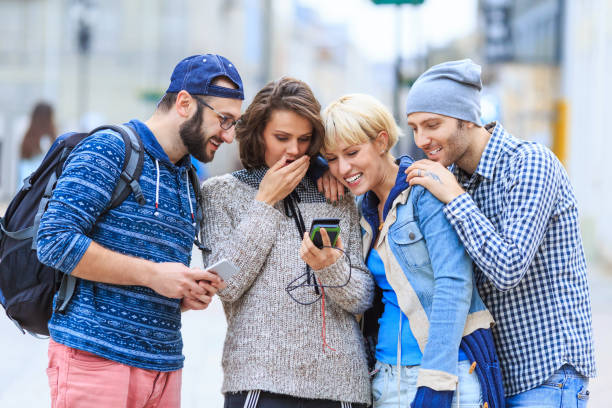istock Tourists enjoying time together in city 916020864