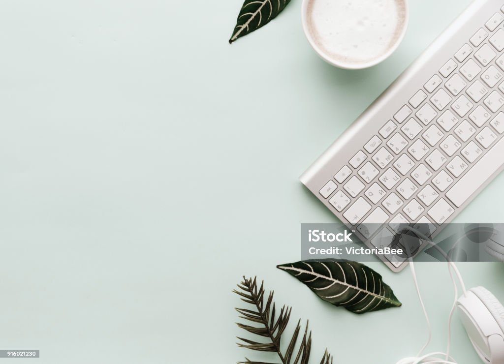 Soft Neutral Styled Desk Scenes With Coffee and Keyboard Blogging Stock Photo