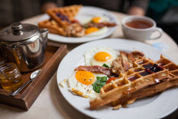 istock Breakfast with bacon, eggs, pancakes, and toast 916021360